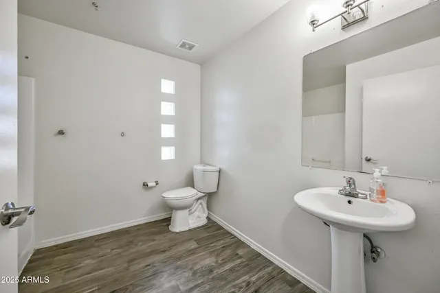 a view of a street with sitting area