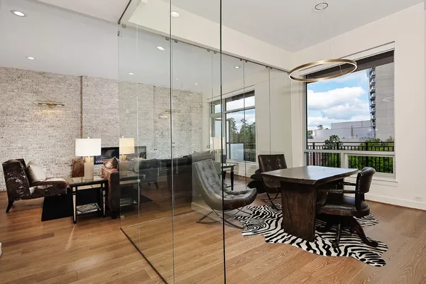 a view of a dining room with furniture window and outside view