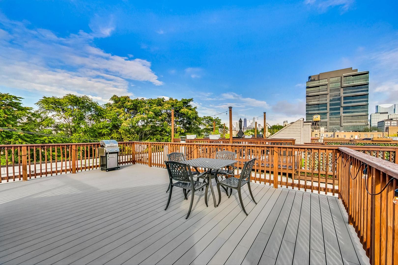 400 North Racine Avenue, Unit 217 Chicago, IL 60642 - Photo 2 of 29 a view of a balcony with chairs