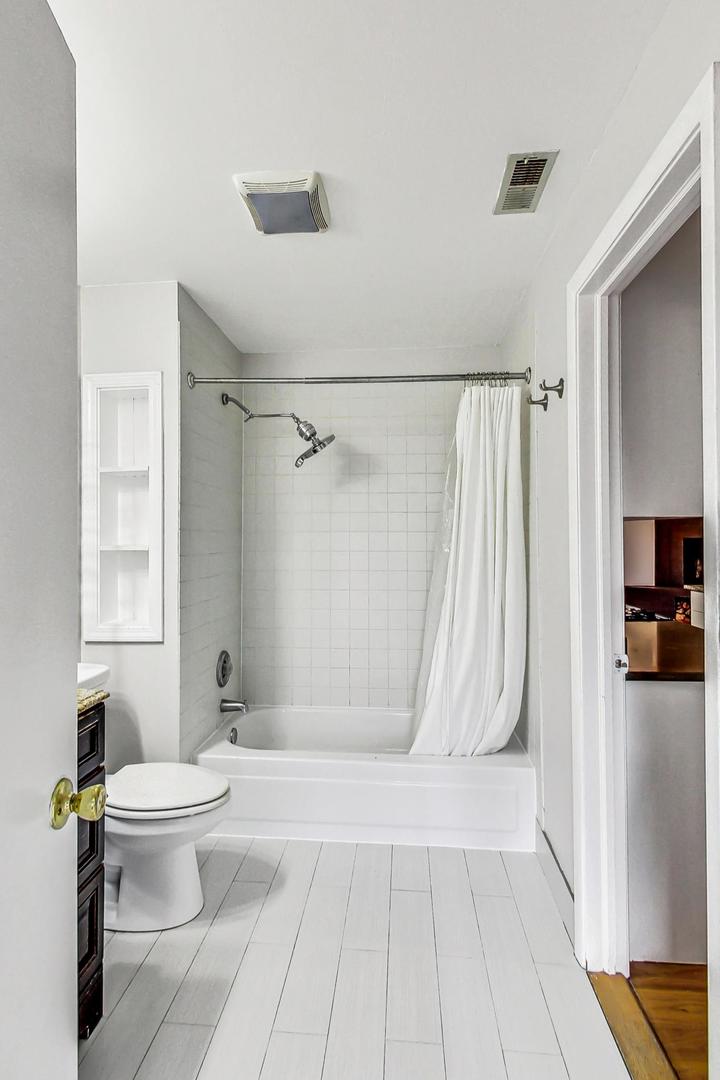 400 North Racine Avenue, Unit 217 Chicago, IL 60642 - Photo 22 of 29 a bathroom with a sink a toilet and shower