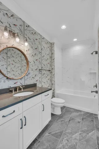 a bedroom with a bed and a cabinets