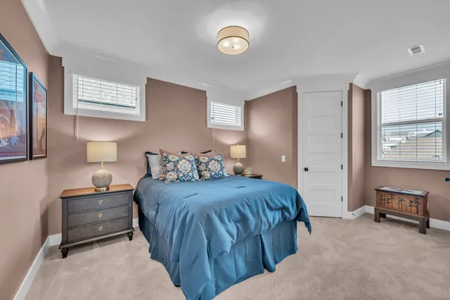 a bedroom with a bed and closet