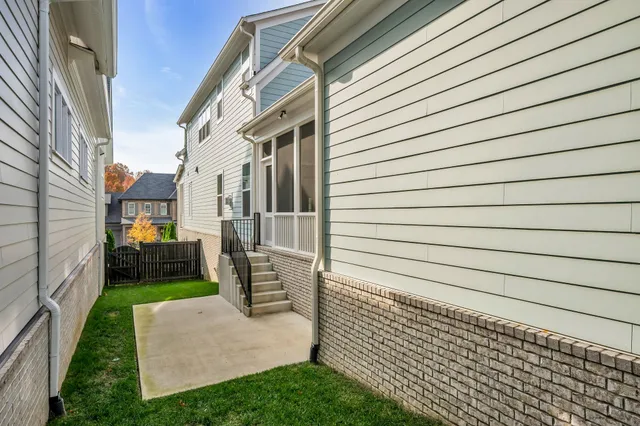 a view of backyard of a house