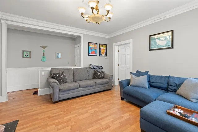 a living room with furniture and a couch