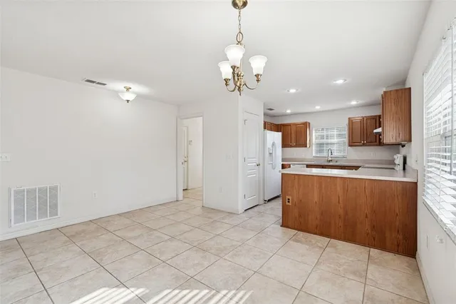 a view of kitchen with windows