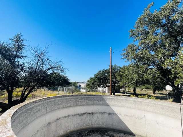 a view of a yard with an outdoor space