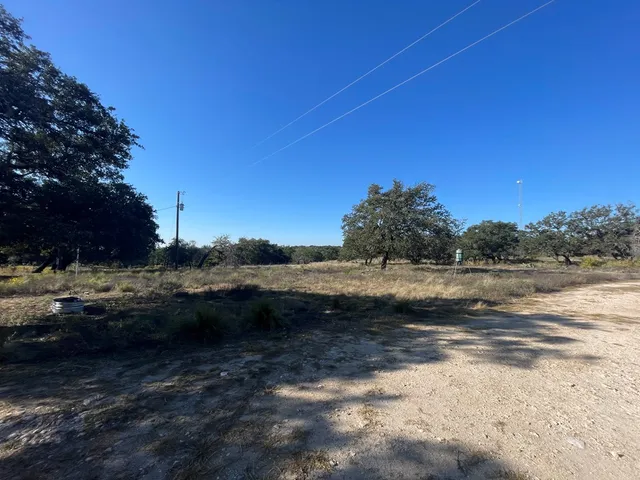 a view of a field with an outdoor space