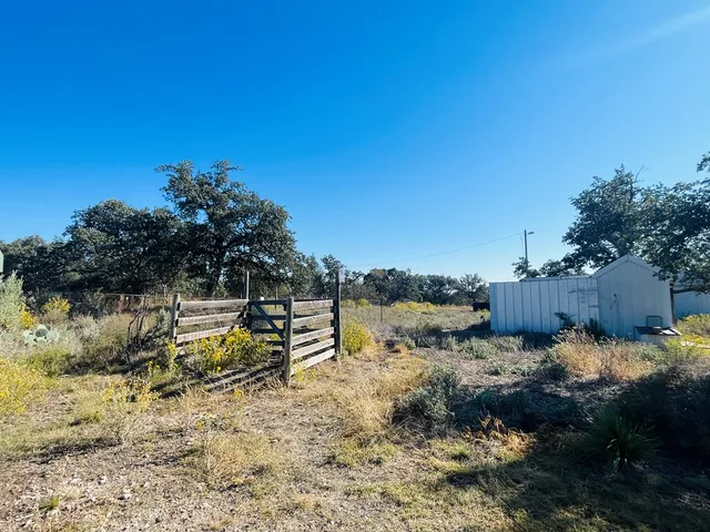 a view of a backyard of a house