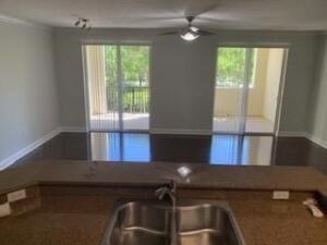 4207 Renaissance Way, Unit 207 Boynton Beach, FL 33426 - Photo 4 of 21 a kitchen with a window