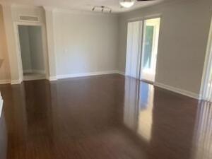 4207 Renaissance Way, Unit 207 Boynton Beach, FL 33426 - Photo 7 of 21 an empty room with windows