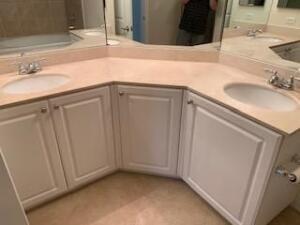 4207 Renaissance Way, Unit 207 Boynton Beach, FL 33426 - Photo 9 of 21 a bathroom with a sink and a mirror