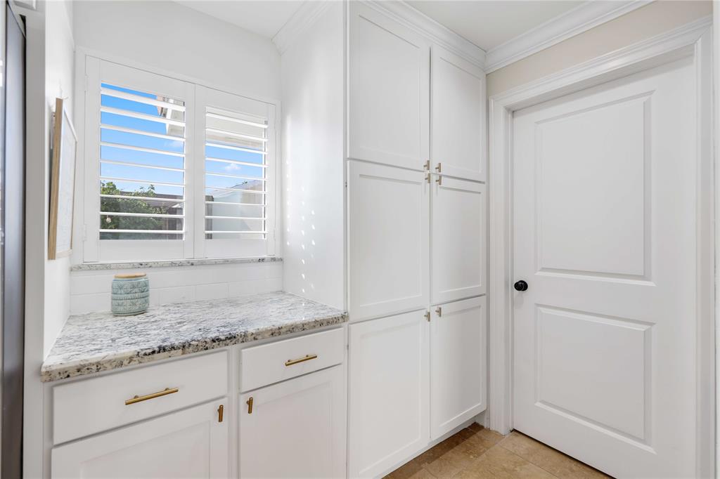 491 Northwest 13th Drive Boca Raton, FL 33486 - Photo 16 of 48 a bathroom with granite countertop cabinets and a granite counter tops