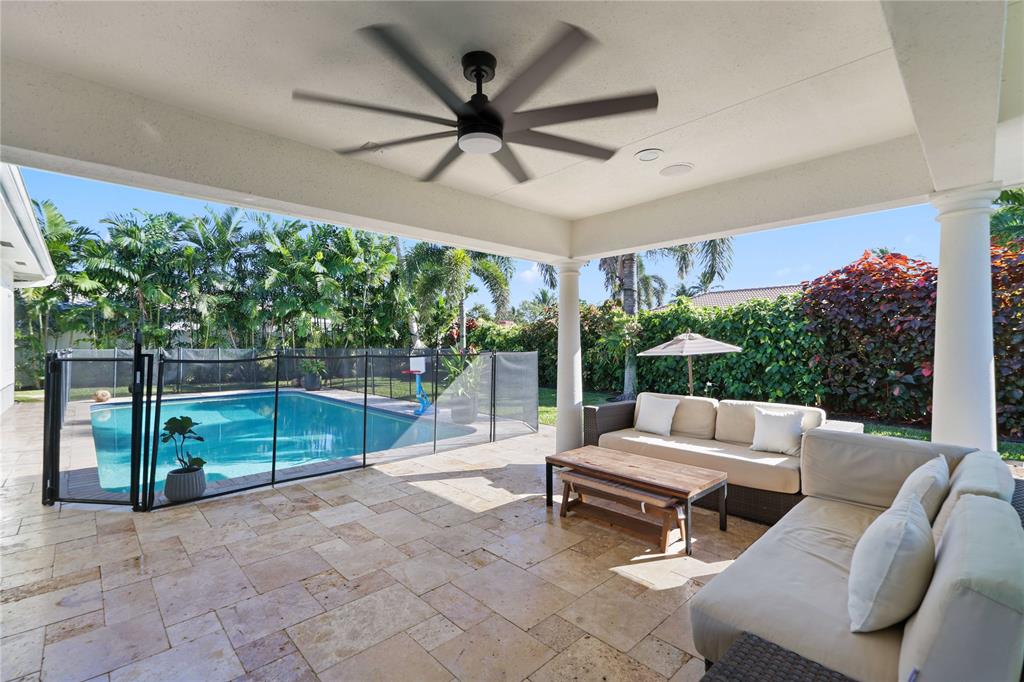 491 Northwest 13th Drive Boca Raton, FL 33486 - Photo 2 of 48 a outdoor space with patio area