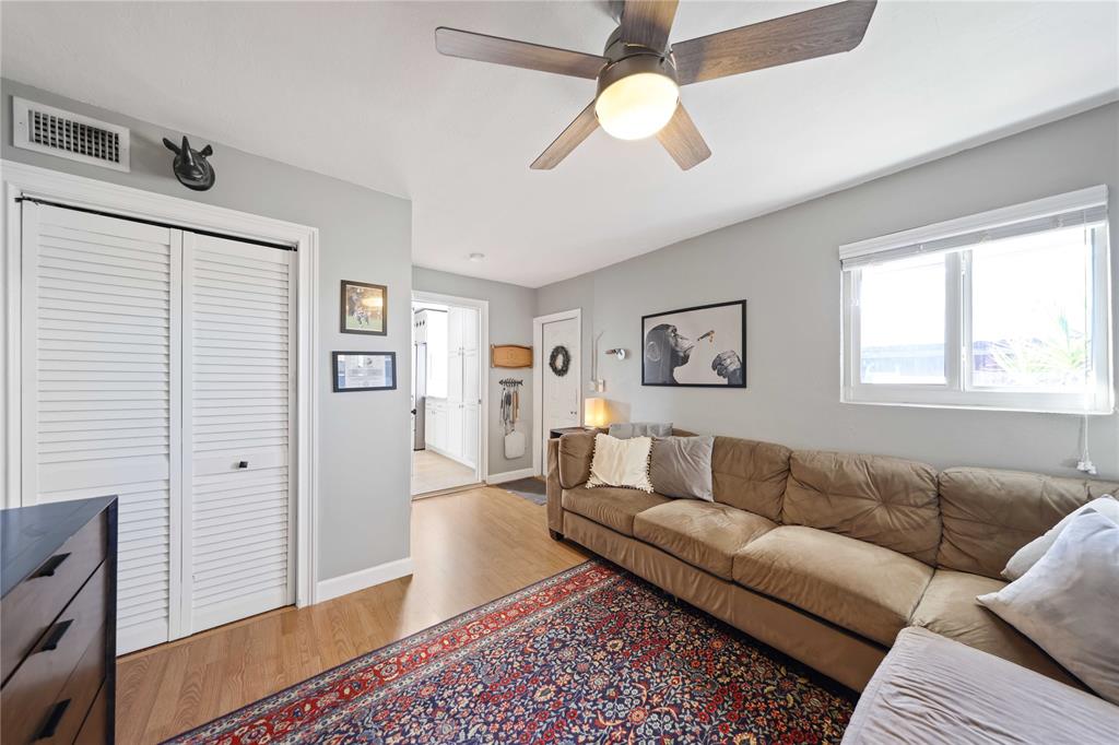 491 Northwest 13th Drive Boca Raton, FL 33486 - Photo 31 of 48 a living room with furniture and a window