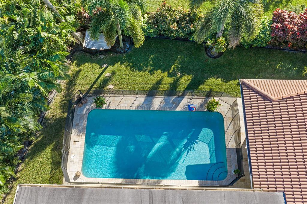 491 Northwest 13th Drive Boca Raton, FL 33486 - Photo 43 of 48 a view of swimming pool from a balcony