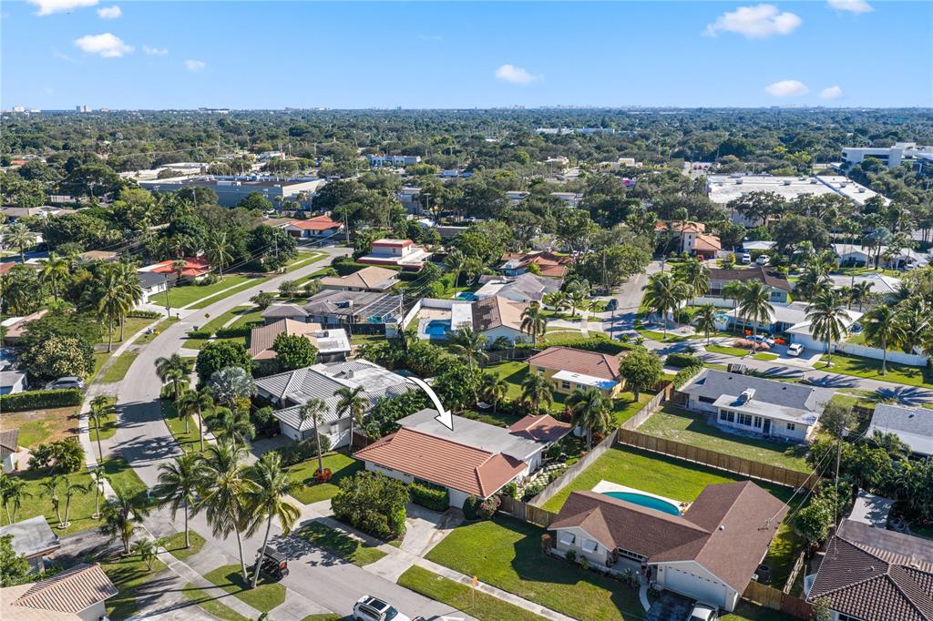 491 Northwest 13th Drive Boca Raton, FL 33486 - Photo 45 of 48 an aerial view of a houses with a swimming pool