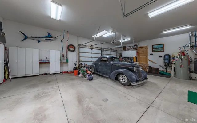 a view of a garage with parked cars