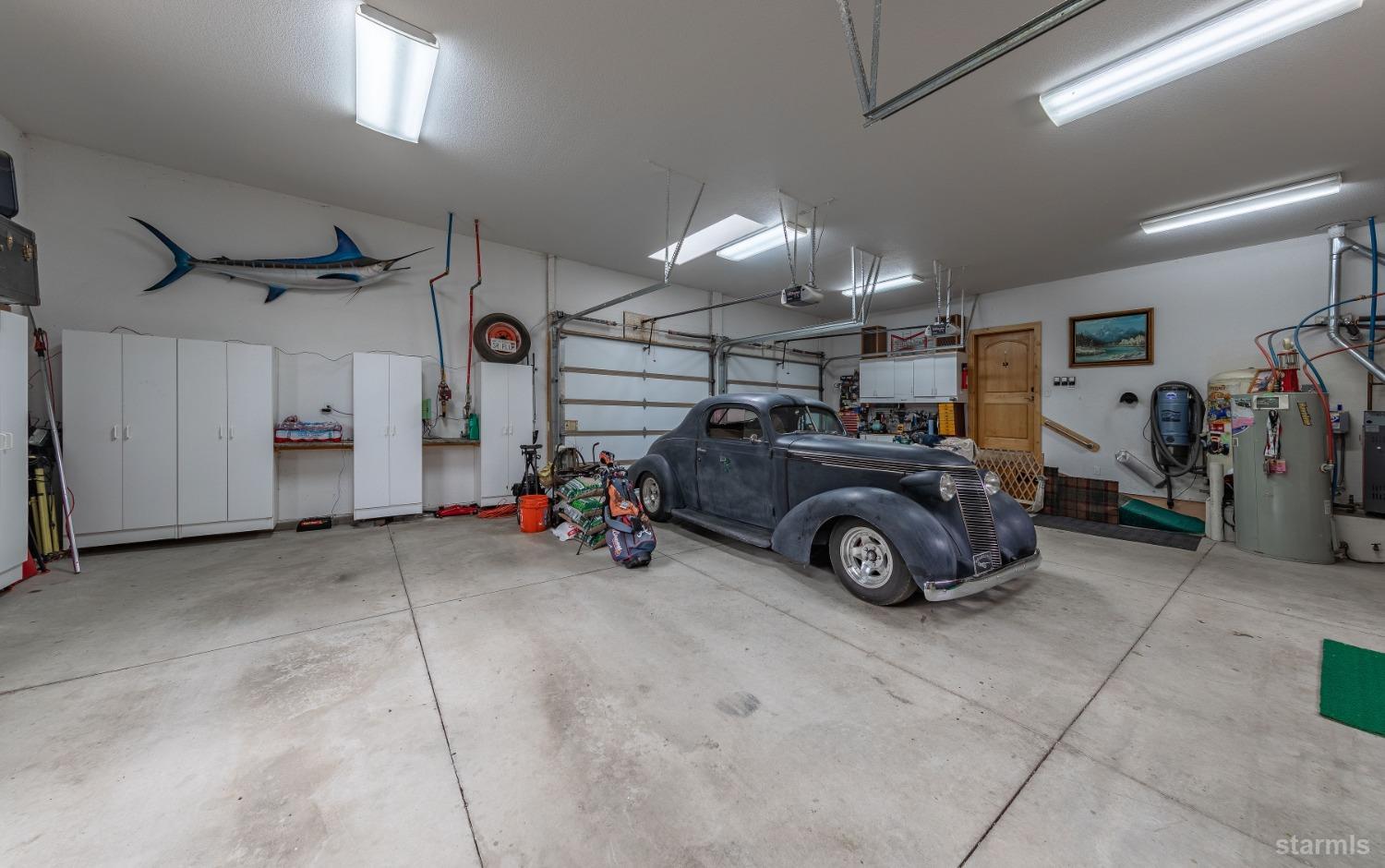 355 River Ranch Road Markleeville, CA 96120 - Photo 24 of 36 a view of a garage with parked cars