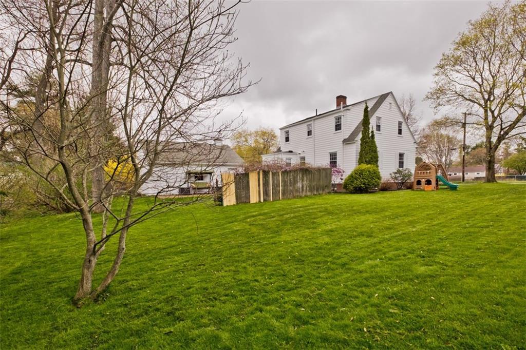 123 Edwards Street Portland, ME 04102 - Photo 35 of 35 Brick patio, privacy wall, and an...