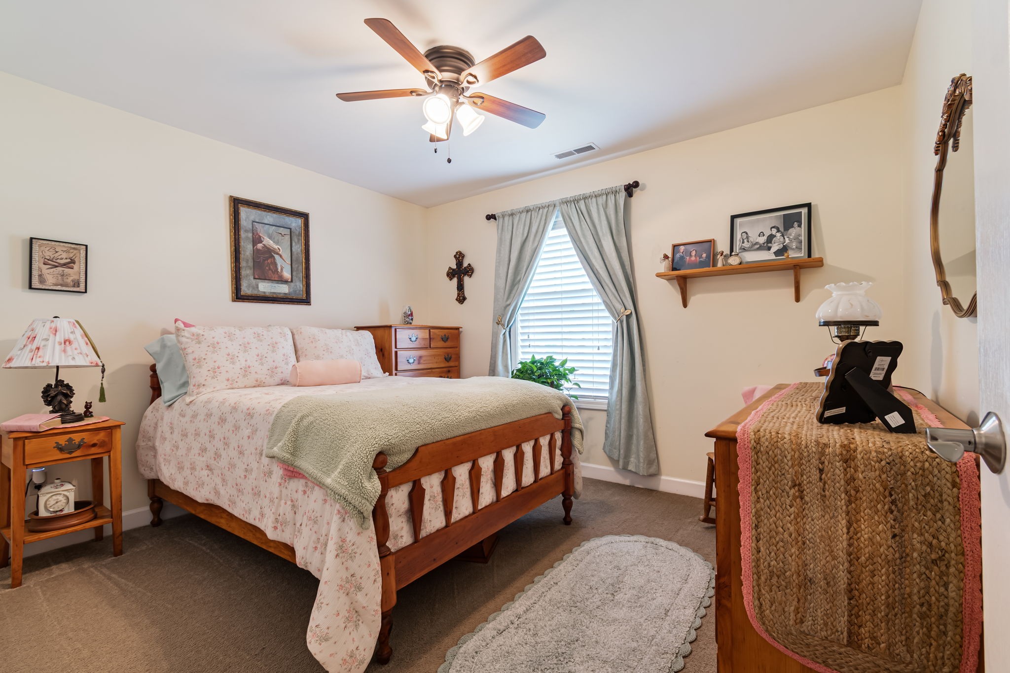 4989 Morning Dove Lane Spring Hill, TN 37174 - Photo 19 of 28 a bedroom with bed and a window