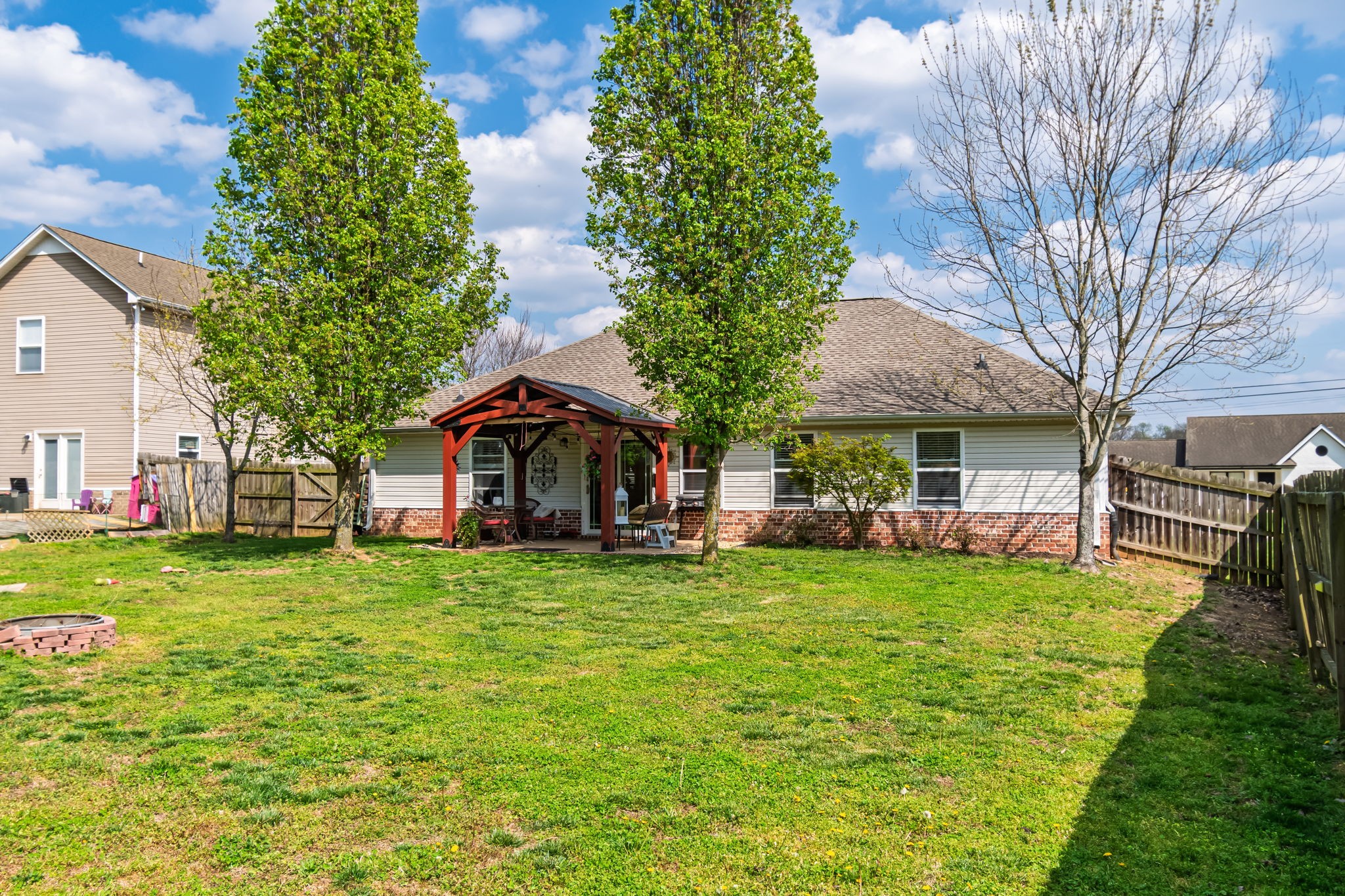 4989 Morning Dove Lane Spring Hill, TN 37174 - Photo 28 of 28 a view of a house with a yard