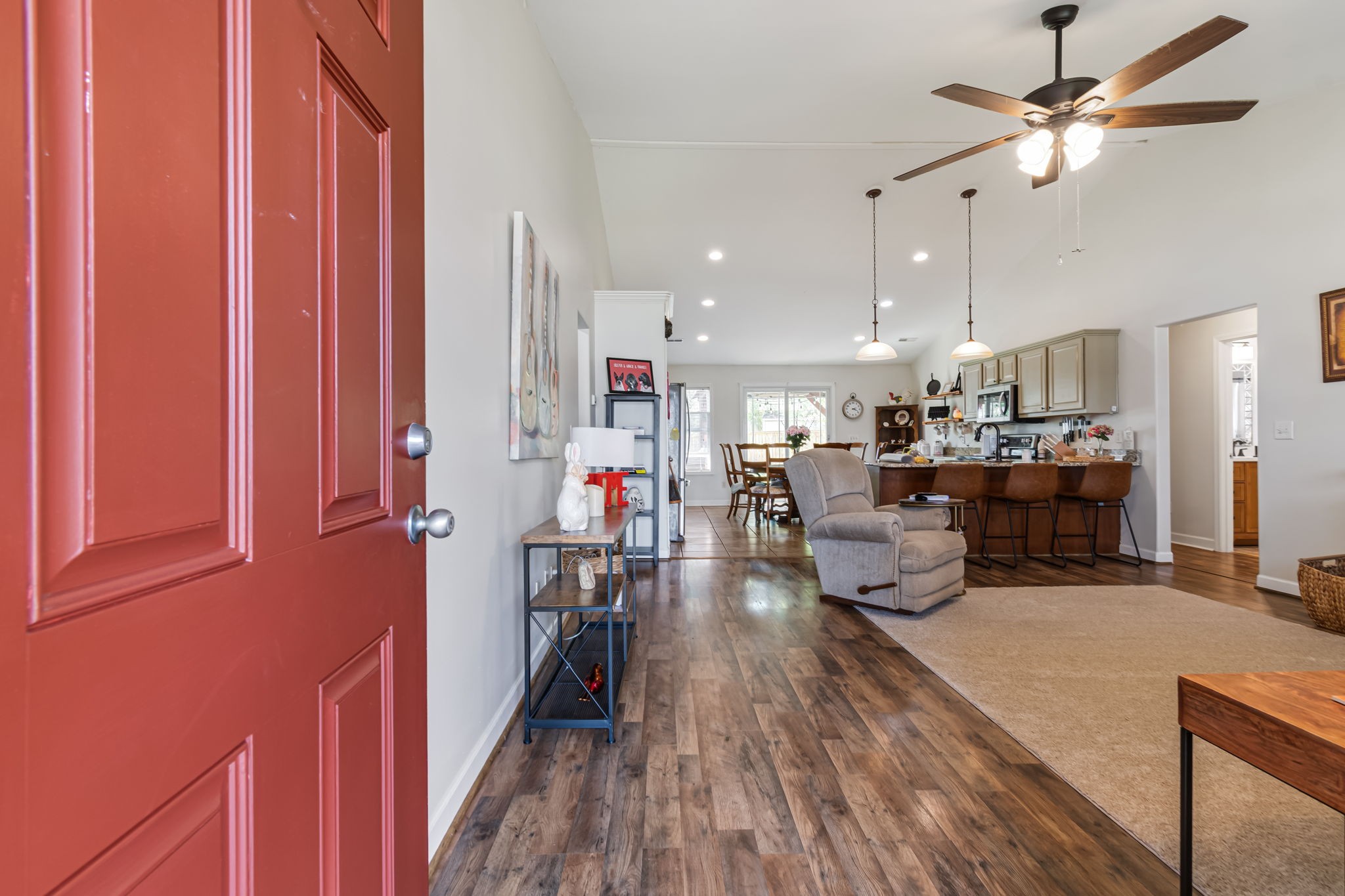 4989 Morning Dove Lane Spring Hill, TN 37174 - Photo 5 of 28 a living room with lots of furniture and kitchen view
