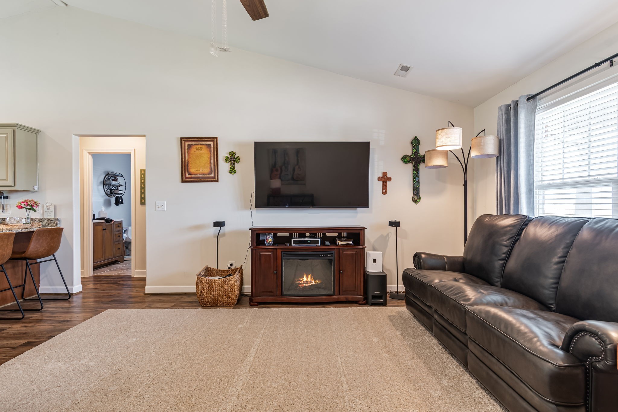 4989 Morning Dove Lane Spring Hill, TN 37174 - Photo 6 of 28 a living room with furniture and a flat screen tv