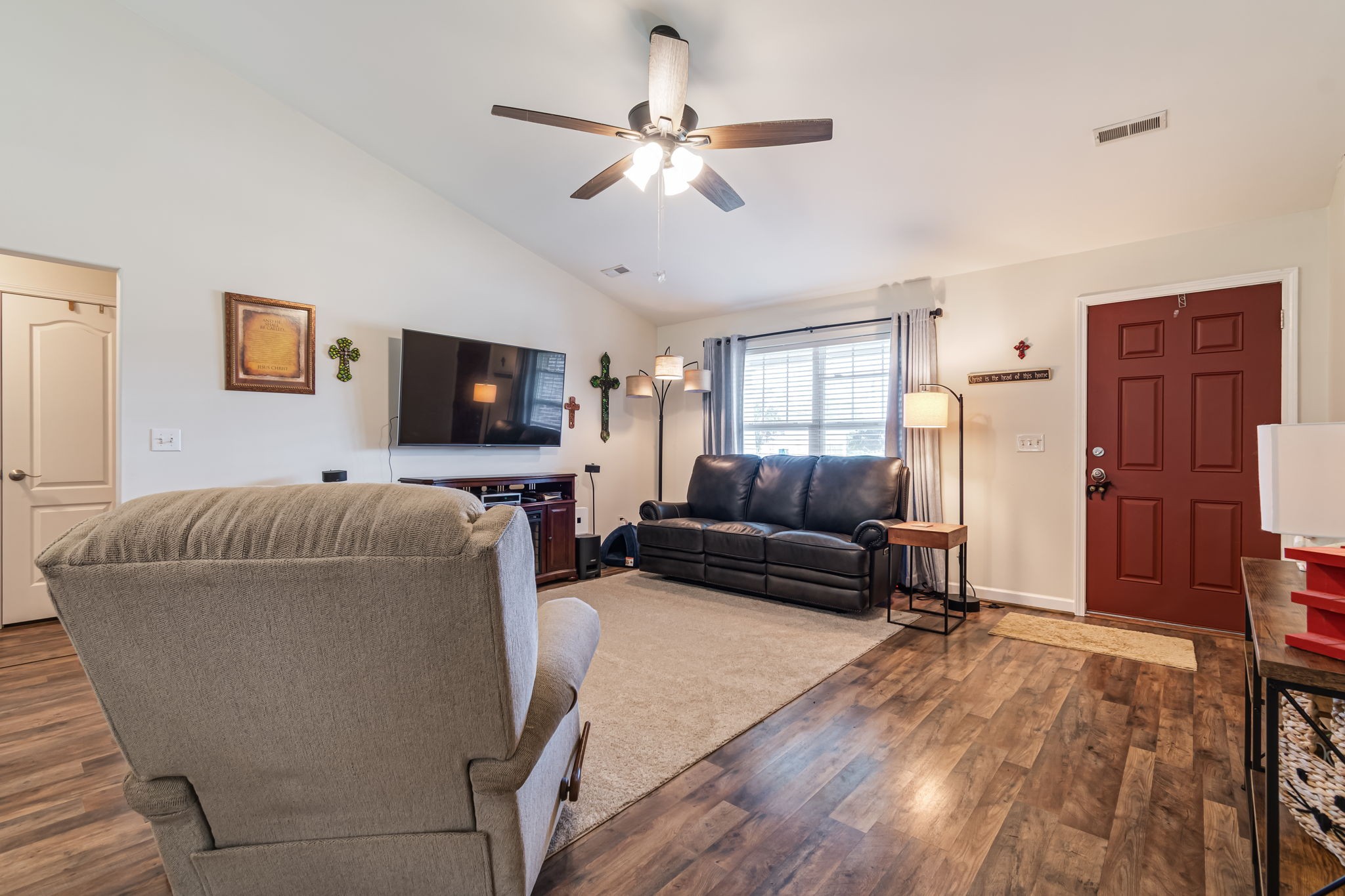 4989 Morning Dove Lane Spring Hill, TN 37174 - Photo 7 of 28 a living room with furniture and a flat screen tv