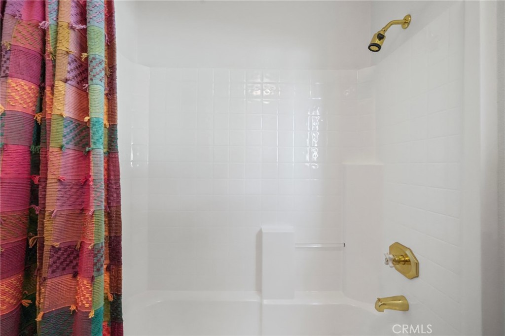 11709 Mint Canyon Road Agua Dulce, CA 91390 - Photo 25 of 49 a bathroom with a bathtub and shower