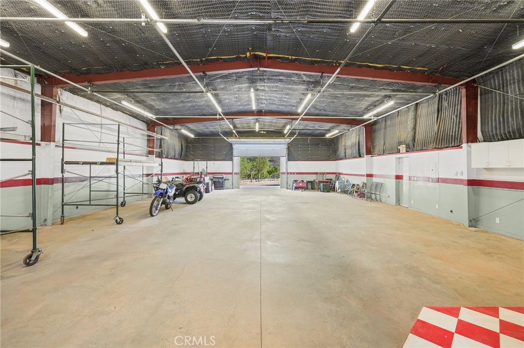 11709 Mint Canyon Road Agua Dulce, CA 91390 - Photo 3 of 49 a view of a bike garage