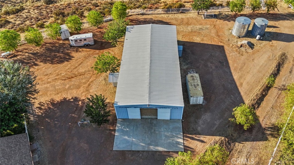 11709 Mint Canyon Road Agua Dulce, CA 91390 - Photo 32 of 49 an aerial view of a house with outdoor space and seating area