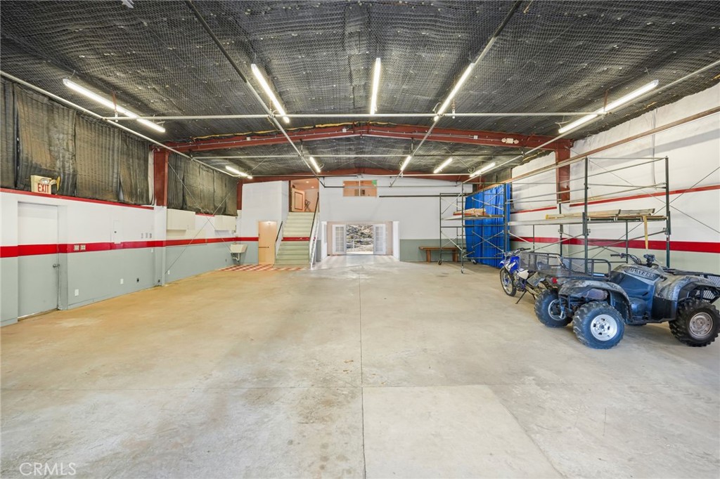 11709 Mint Canyon Road Agua Dulce, CA 91390 - Photo 33 of 49 a view of a garage with storage