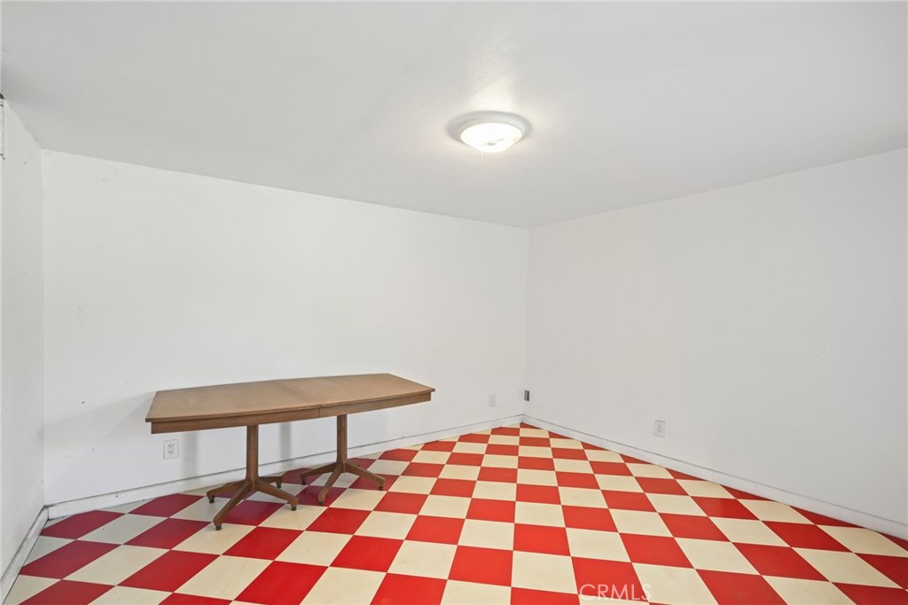 11709 Mint Canyon Road Agua Dulce, CA 91390 - Photo 34 of 49 a picture of a room with a black and white checkered floor