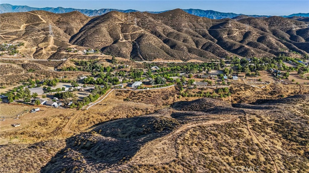 11709 Mint Canyon Road Agua Dulce, CA 91390 - Photo 44 of 49 a view of a backyard of the house