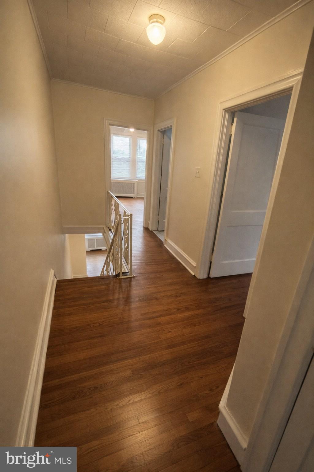 652 Jamestown Avenue Philadelphia, PA 19128 - Photo 6 of 13 a view of entryway and hall with wooden floor
