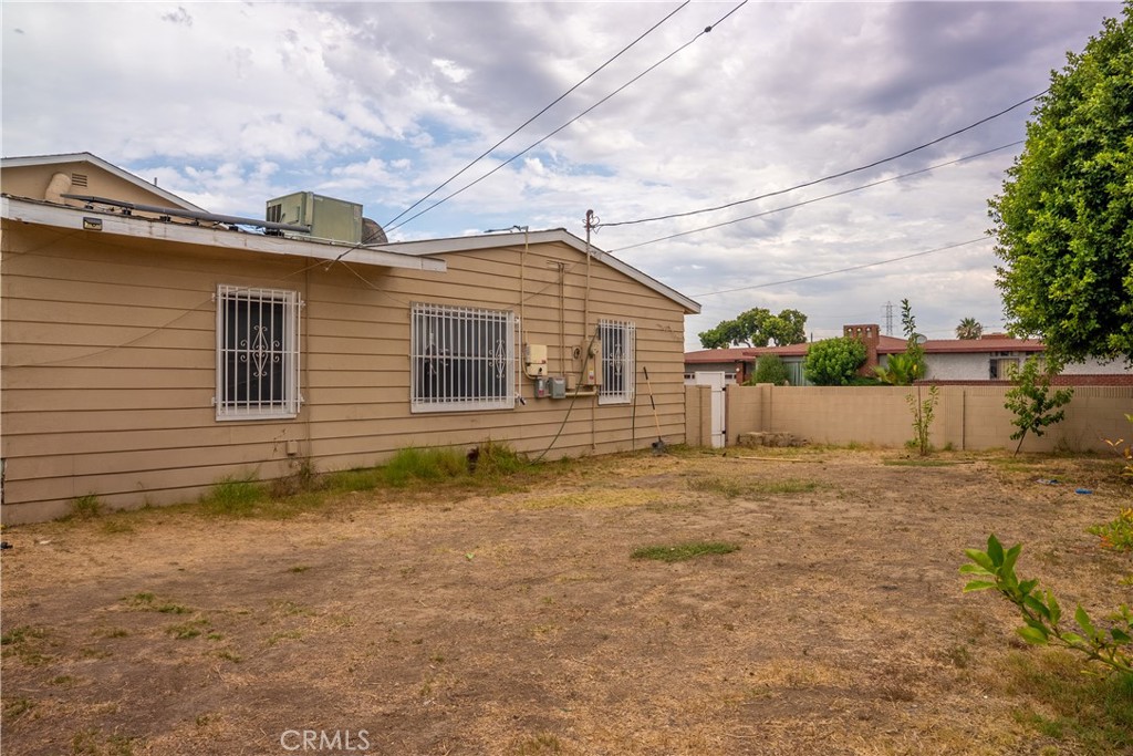 500 South Clymar Avenue Compton, CA 90220 - Photo 17 of 20 a view of a house with a yard