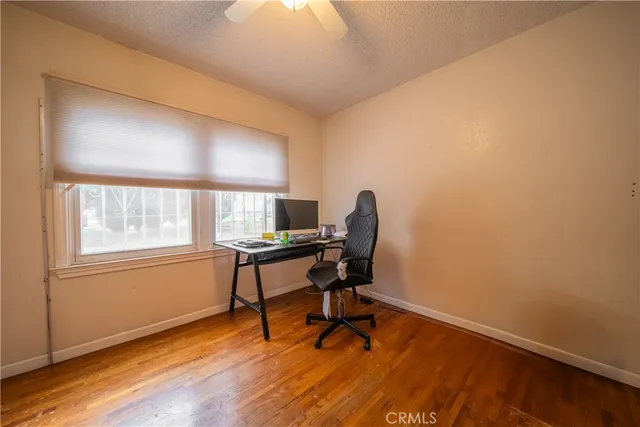 a workspace with furniture and a window
