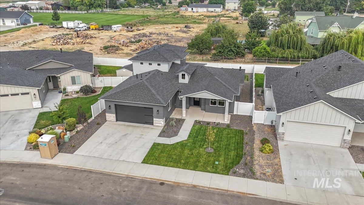 72 South Ravine Way Nampa, ID 83687 - Photo 44 of 48 Modern gray exterior with dark trim and stone accents