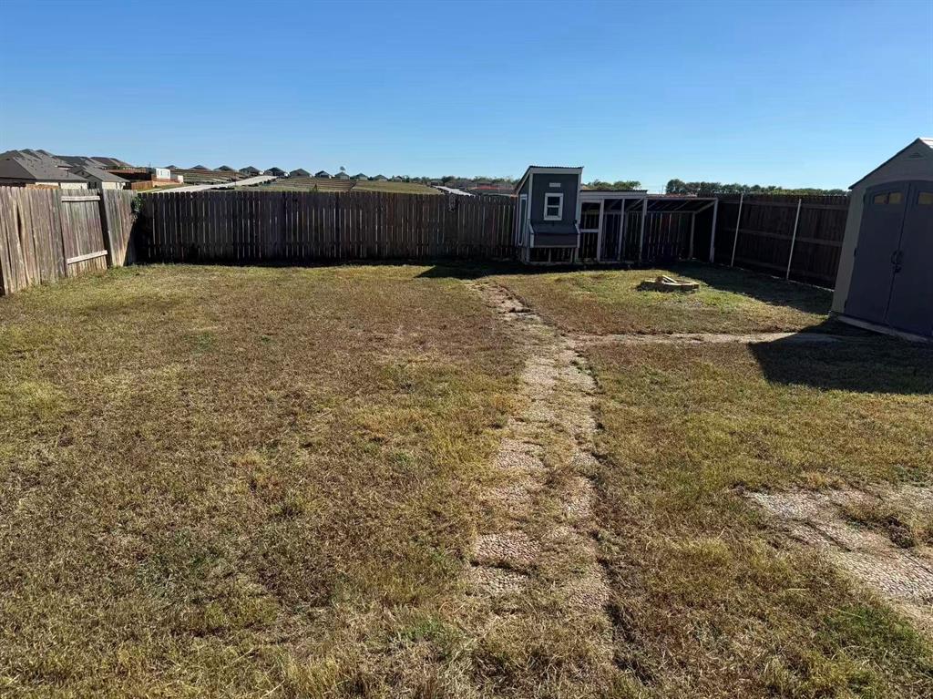 1806 Douglas Street Howe, TX 75459 - Photo 14 of 15 a view of a backyard