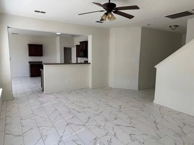 a view of a livingroom with a flat screen tv