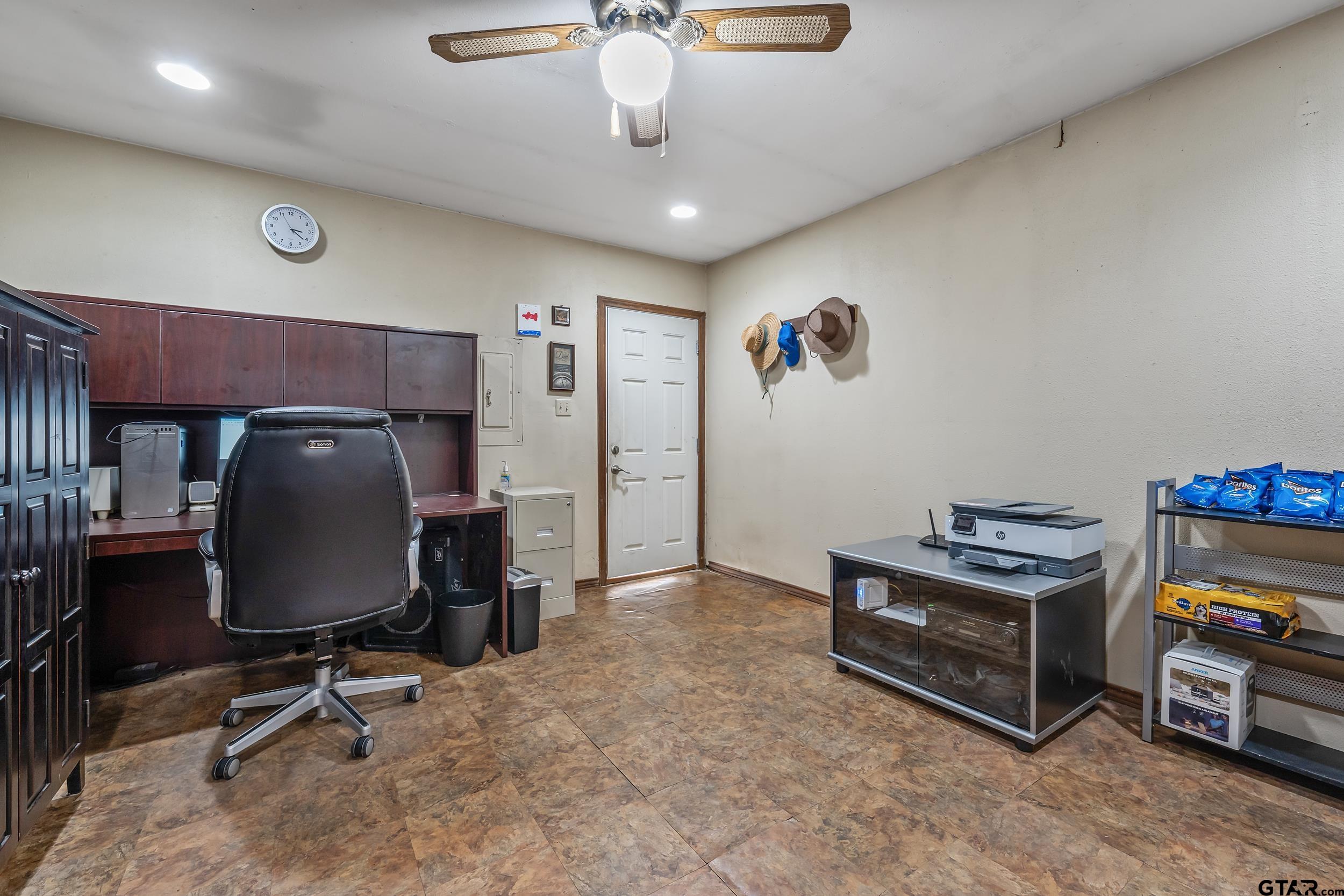 449 Ruth Street Hawkins, TX 75765 - Photo 11 of 33 a view of a workspace with furniture