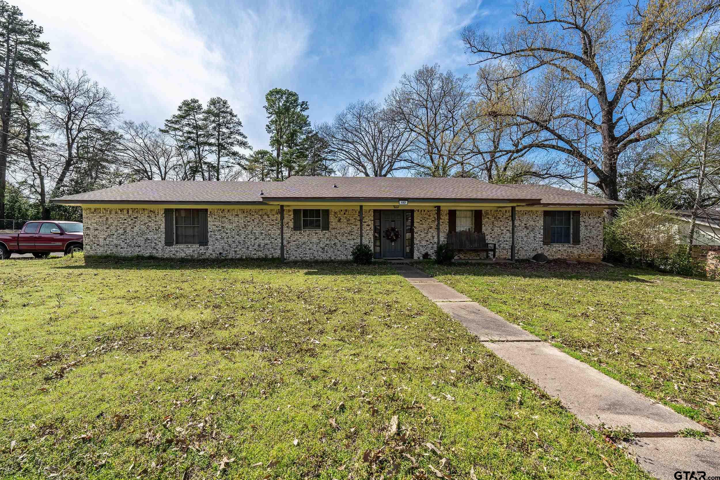 449 Ruth Street Hawkins, TX 75765 - Photo 28 of 33 a view of a house with a backyard