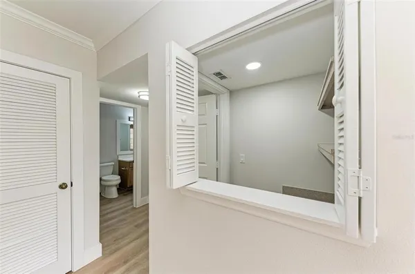 a bathroom with a glass shower door