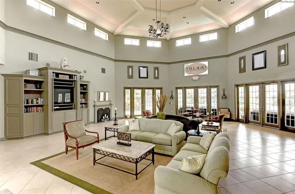 a room with gym equipment and a large window