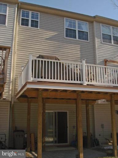 692 Luthardt Road Middle River, MD 21220 - Photo 15 of 16 Maintenance free deck and lower brick paver patio