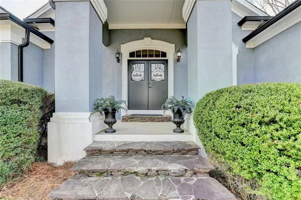 a view of a livingroom with furniture and a window