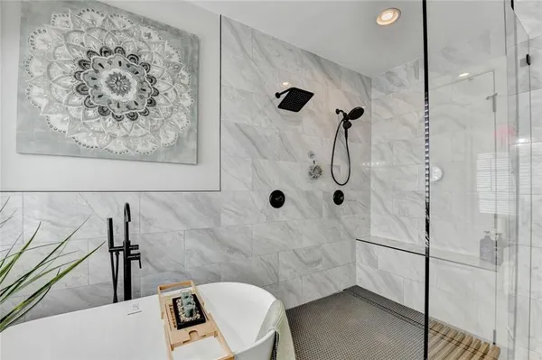 a view of a patio with a table and chairs