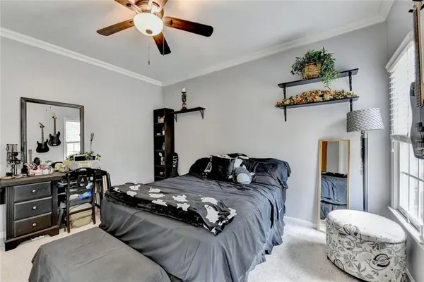 an aerial view of houses with trees