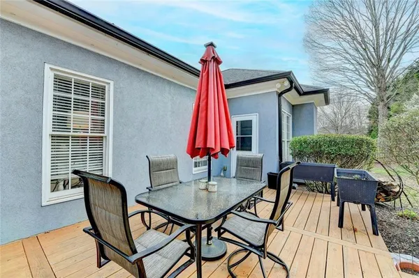 an aerial view of a house with a swimming pool