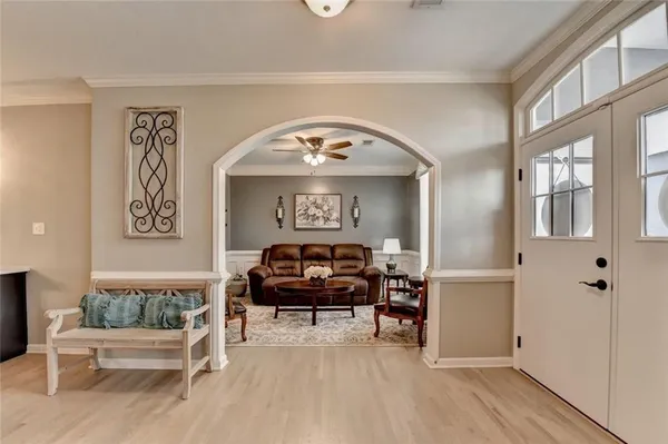 a living room with furniture and a window